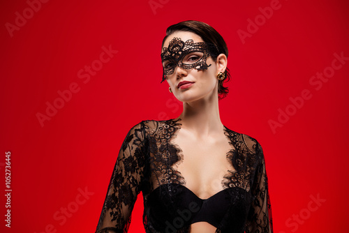 Photo of attractive sexy young girl hot model dressed lace black dress mask queen incognito red color background