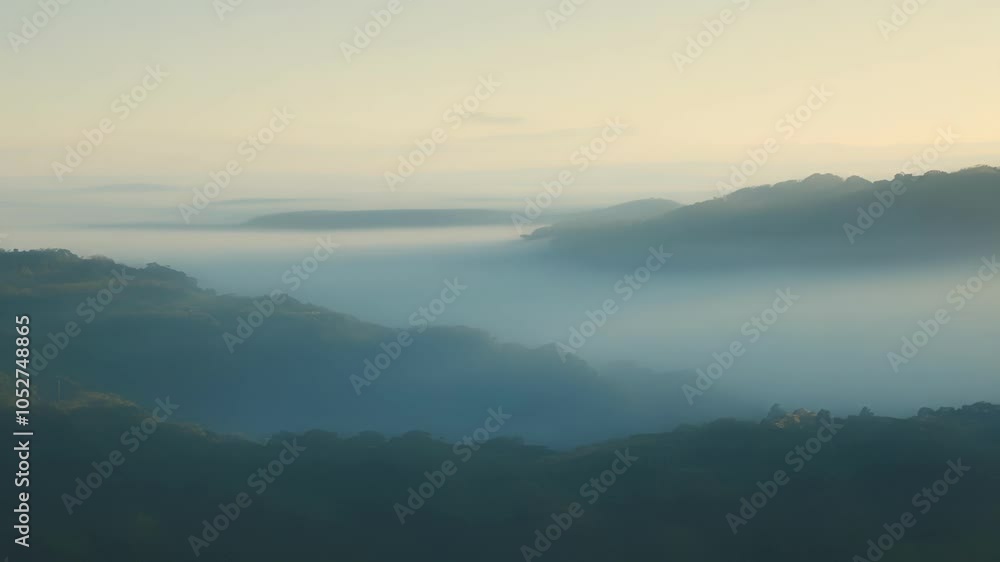 Gentle mist enveloping lush, forested hills in the evening light, creating a surreal and tranquil atmosphere. The scene captures the beauty of nature in transition Gentle mist enveloping lush, forested hills in the evening light, creating a surreal and tranquil atmosphere. The scene captures the beauty of nature in transition
