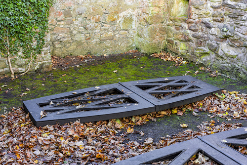 Cast iron mortsafe in an old Scottish churchyard to protect burials photo