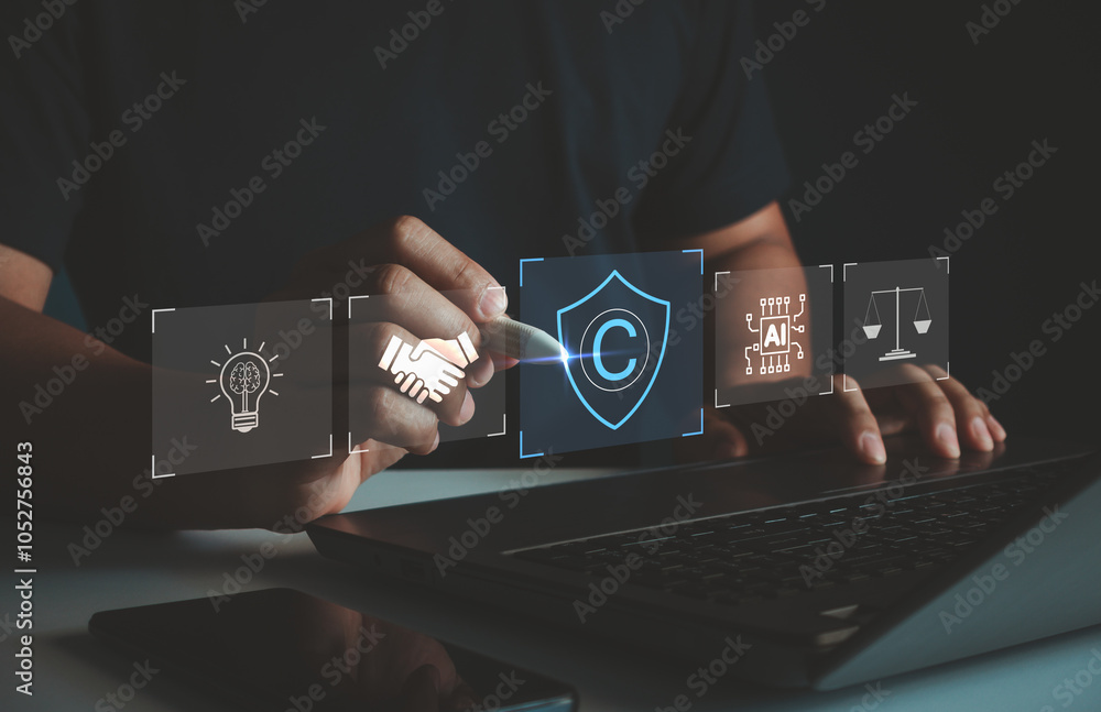 © MUNTHITA - Digital copyright or patent concept. Laws regarding copyright and patents on intellectual property arising from artificial intelligence technology. Patented technology concept for business.