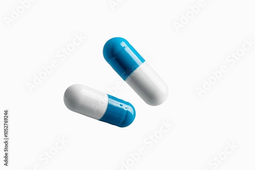 White and blue medicine capsule tablet float on white background