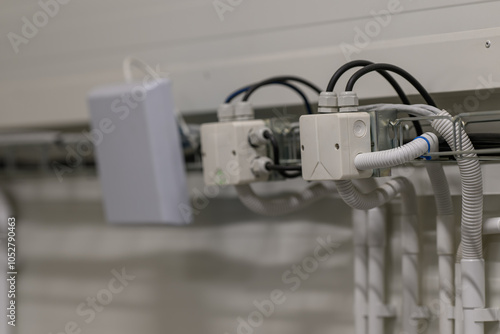 Fotografía Two boxes and a wifi multiplier on the cable grid.