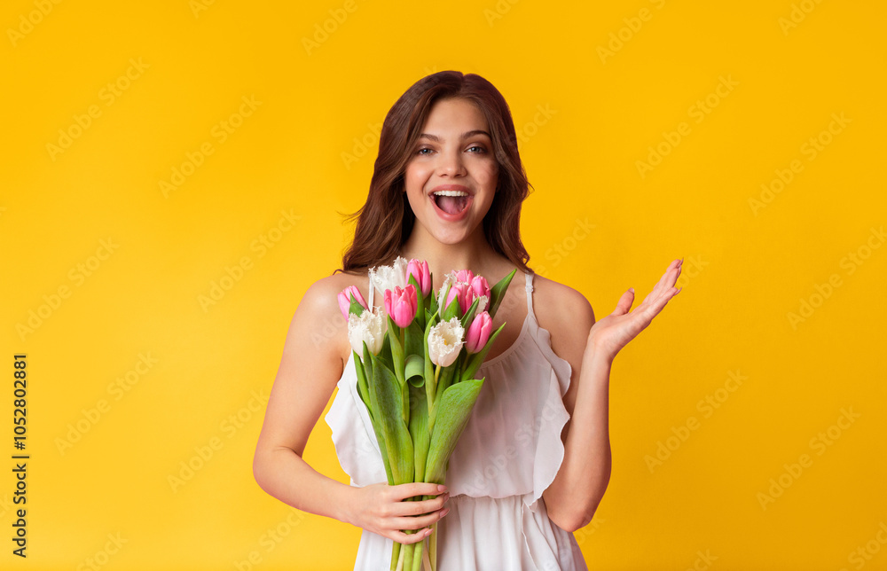 What A Surprise. Dazed Young Lady Holding Tulip Bouquet And Emotionally Gesturing In Excitement, Posing With Happy Expression Over Colorful Background What A Surprise. Dazed Young Lady Holding Tulip Bouquet And Emotionally Gesturing In Excitement, Posing With Happy Expression Over Colorful Background