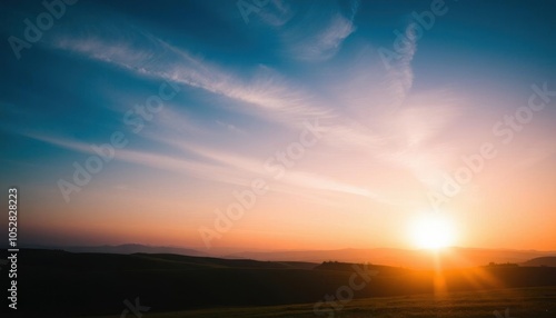 araffes in a field with a sunset in the background, sunset photo at golden hour