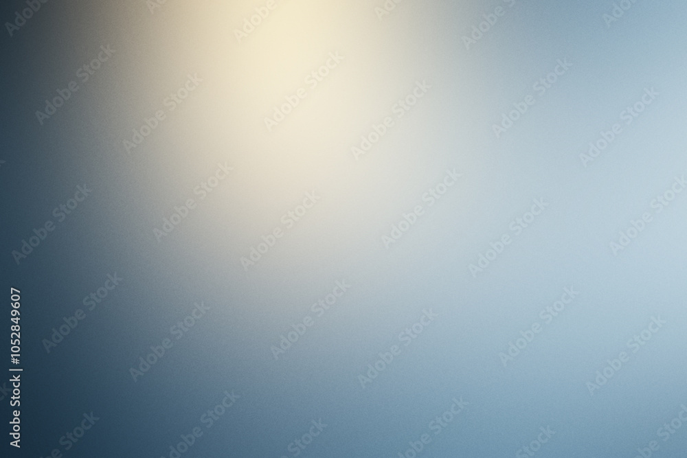A blurry blue background with a yellow light shining on it. Noisy background with grain A blurry blue background with a yellow light shining on it. Noisy background with grain