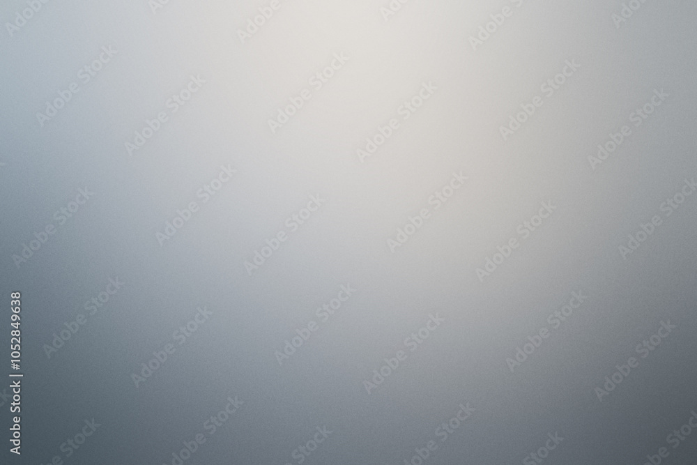 A blurry gray background with no visible objects. Noisy background with grain A blurry gray background with no visible objects. Noisy background with grain