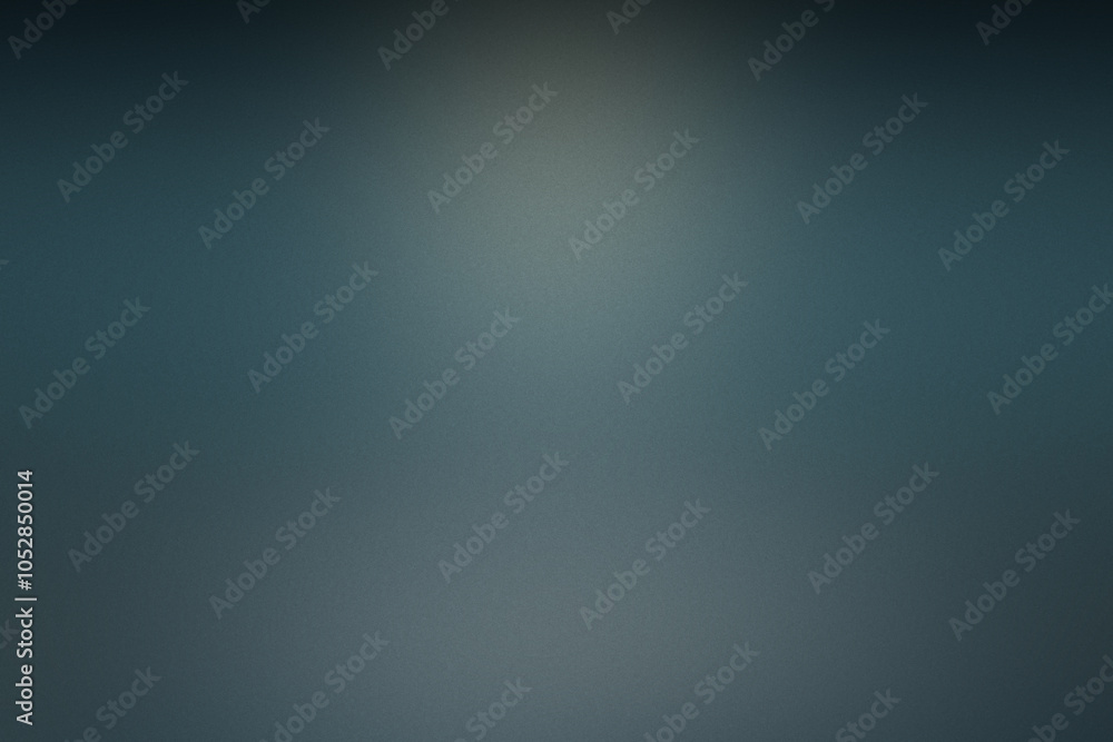 A blurry blue background with a light shining on it. Noisy backdrop with grain A blurry blue background with a light shining on it. Noisy backdrop with grain