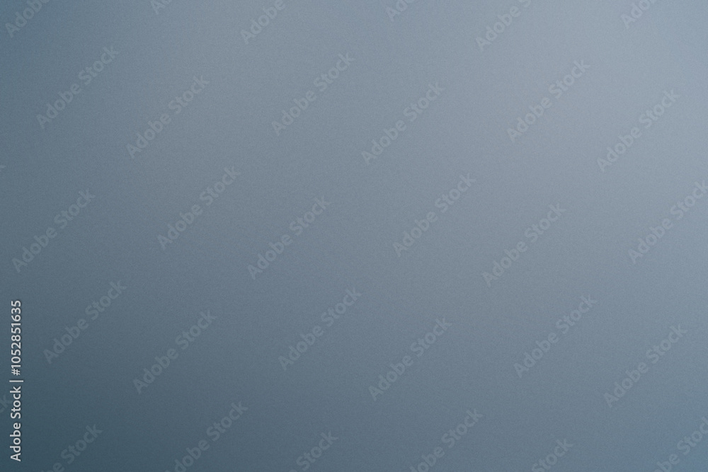 A blue background with a few white dots. Noisy backdrop with grain A blue background with a few white dots. Noisy backdrop with grain