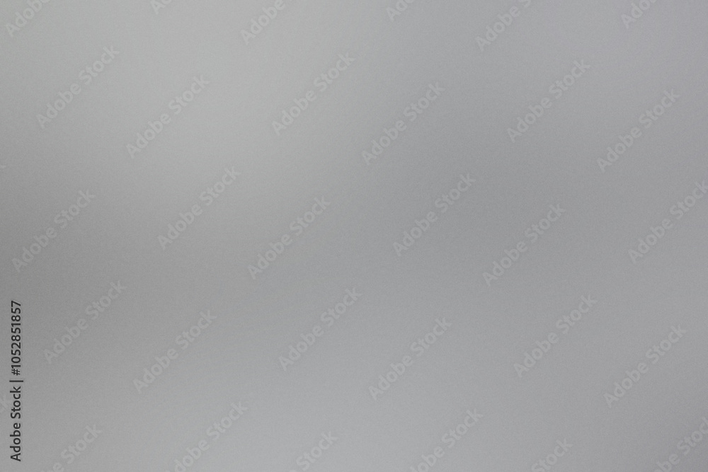 A grey background with a blurry image of a person. Noisy backdrop with grain A grey background with a blurry image of a person. Noisy backdrop with grain