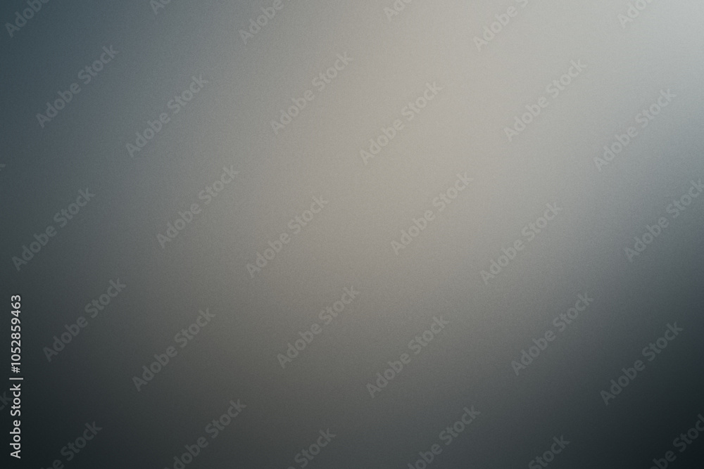 A blurry gray background with a white object in the foreground. Noisy backdrop with grain A blurry gray background with a white object in the foreground. Noisy backdrop with grain
