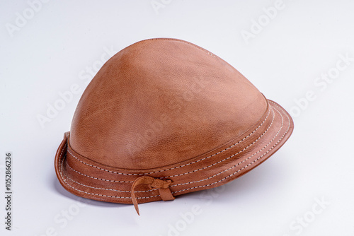 Traditional leather hat worn by cowboys from the northeastern region of Brazil, in studio with a white background.