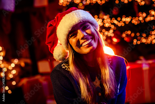 Photo of pretty young girl troothy smile good mood christmas holiday time ilumination apartment indoors photo