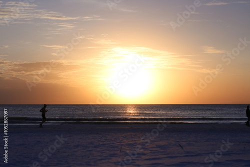runner at sunset on the beach