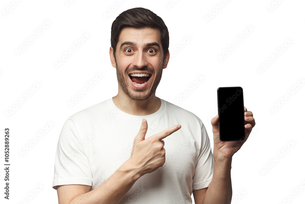 Excited screaming wow young man in white t-shirt presenting phone and pointing with finger at blank black screen Excited screaming wow young man in white t-shirt presenting phone and pointing with finger at blank black screen