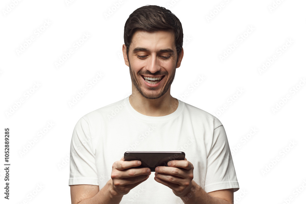 Handsome laughing young man in white t-shirt, holding phone, playing video game Handsome laughing young man in white t-shirt, holding phone, playing video game