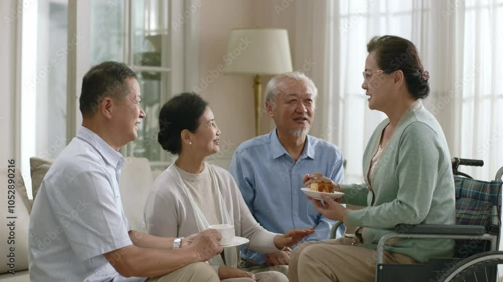 group of happy senior asian people two couples chatting in nursing home or hospital group of happy senior asian people two couples chatting in nursing home or hospital