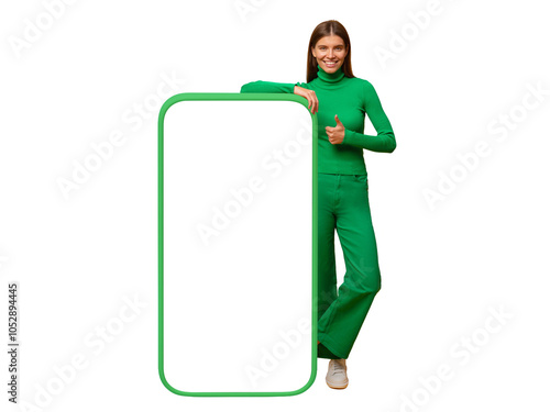 Happy young woman standing and showing blank screen of huge phone, mock up for your app photo