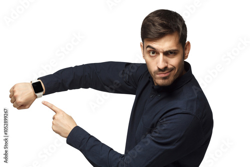 Konstfotografi It's time to act! Young man pointing at watch with impatience as if asking to hu