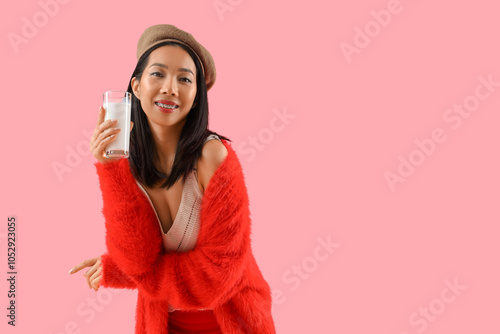 Young Asian woman with glas...