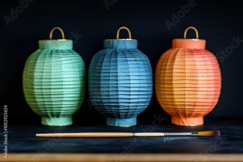 Colorful Paper Lanterns and Paintbrush on Black Background Asian Decor Festival Lights photo