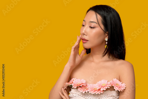 Pretty young Asian woman wi...