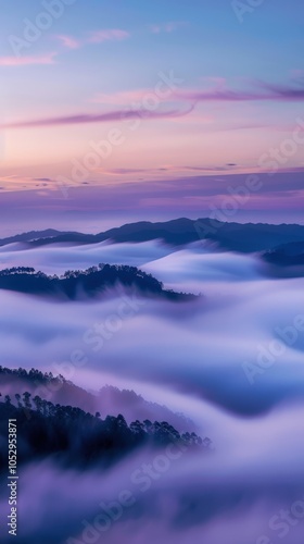 Wallpaper Mural Mountains Enshrouded: Mystical Blue Hour Dawn Over Fog-Covered Peaks  Torontodigital.ca