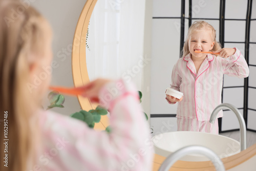 Cute little girl with powde...