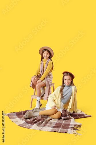 Cute girls in autumn clothe...