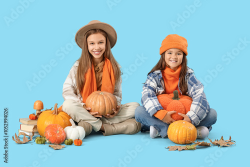 Cute girls in autumn clothe...