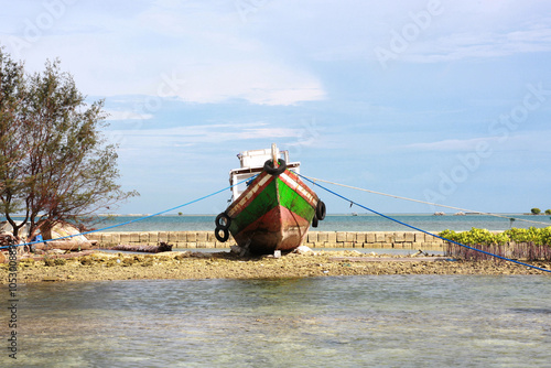 The old ships are parked on Pramuka Island, Jakarta photo