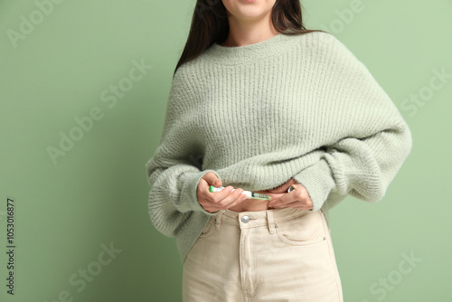 Diabetic young woman using ...