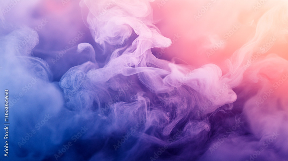 Fototapeta premium Colorful smoke swirls blend pink and blue hues in a dreamy abstract background display