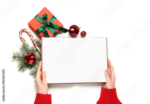Female hands with blank ope...