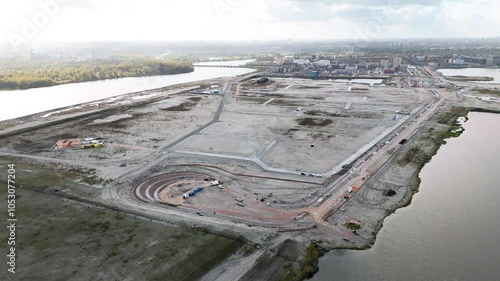 Strandeiland construction site in Amsterdam, early-stage infrastructure development for sustainable housing on this artificial island in IJburg. Aerial view. photo