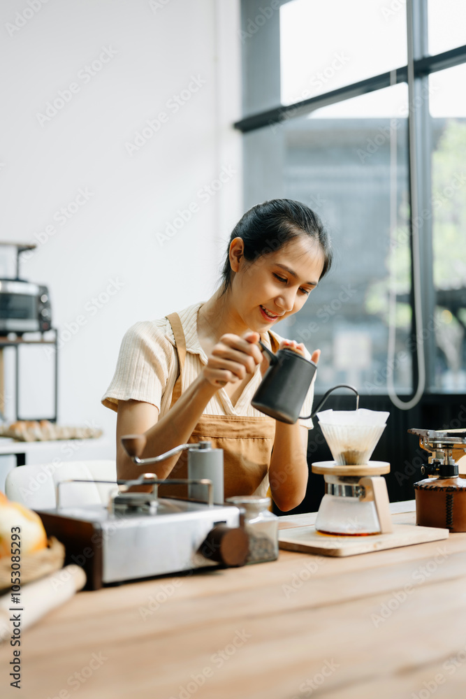 Asian barista brewing fresh espresso. Enjoy a cozy, trendy cafe experience with high quality beans in home or cafe Asian barista brewing fresh espresso. Enjoy a cozy, trendy cafe experience with high quality beans in home or cafe