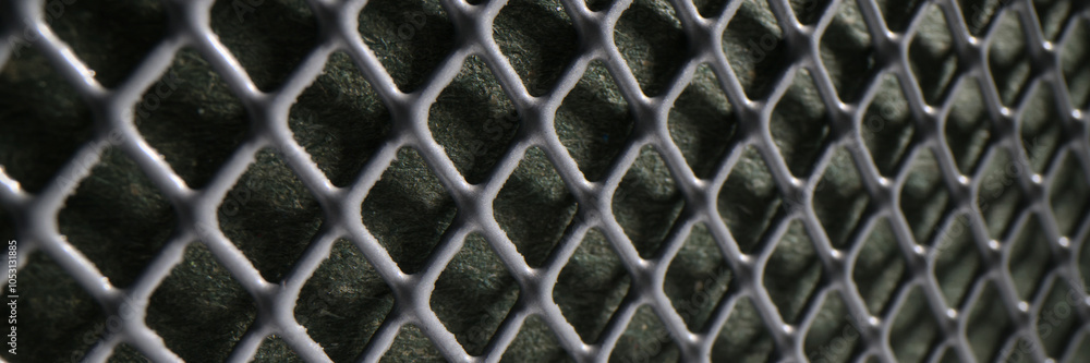Naklejka premium Durable large metal mesh as abstract industrial background