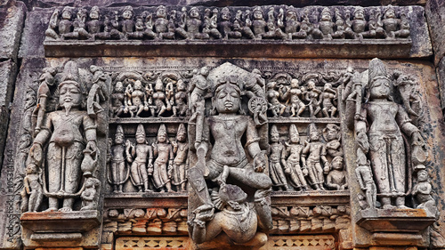 Wallpaper Mural Carved sculptures of the supreme Hindu deities Brahma, Vishnu, and Mahesh on Ekla Temple, located in Kadwaya, Ashoknagar, Madhya Pradesh, India. Torontodigital.ca