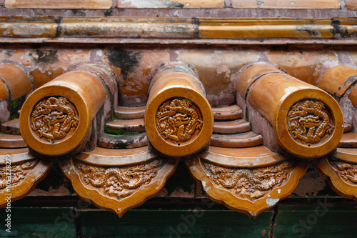 Orange roof tiles of Beijing Forbidden City with dragon pattern, China