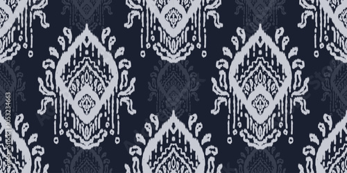 Ethnic ikat seamless pattern.beautiful pattern. floral embroidery, bohemian style, abstract flower art print. ethnic ikat abstract art. seamless fabric. ikat design for fabric, wallpaper, clothing.