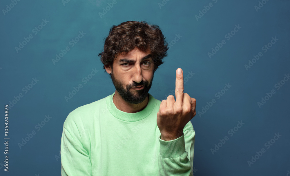Naklejka premium feeling angry, annoyed, rebellious and aggressive, flipping the middle finger, fighting back