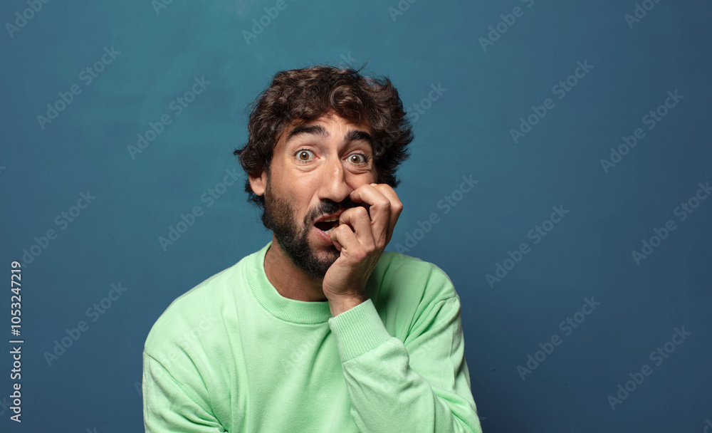 open-mouthed in shock and disbelief, with hand on cheek and arm crossed, feeling stupefied and amazed open-mouthed in shock and disbelief, with hand on cheek and arm crossed, feeling stupefied and amazed
