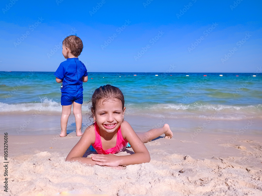 Happy children enjoying their vacation at the beach, in sousse, tunisia Happy children enjoying their vacation at the beach, in sousse, tunisia