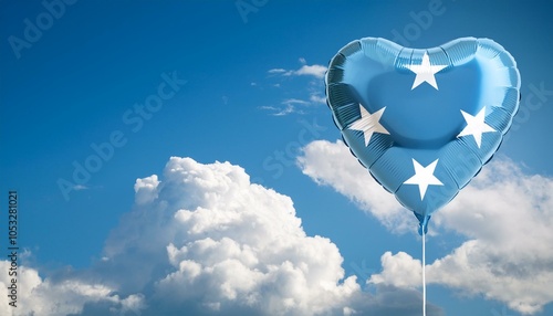 ミクロネシアの国旗のハート型の風船と青空(Micronesia flag heart-shaped balloon and blue sky.)
 photo