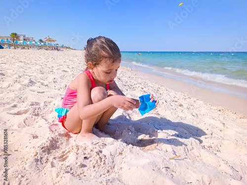 Happy children enjoying their vacation at the beach, in sousse, tunisia