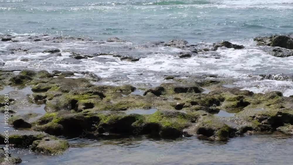 Sea coast landscape. Waves on rocky and sand beach. Jeju island, Korea Sea coast landscape. Waves on rocky and sand beach. Jeju island, Korea
