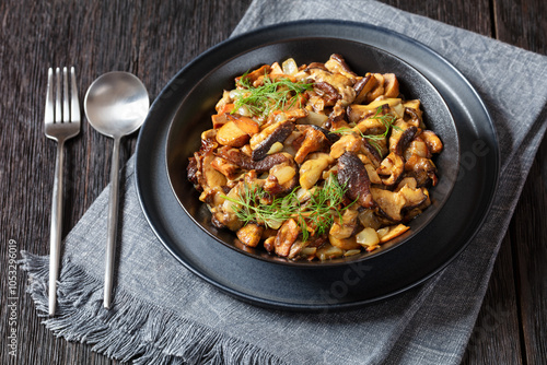 fried blend of wild mushrooms in a bowl photo