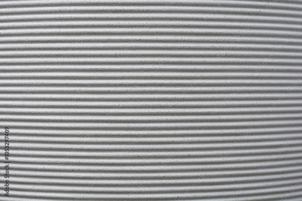 Textured light grey surface with horizontal stripe - flower pot detail Textured light grey surface with horizontal stripe - flower pot detail