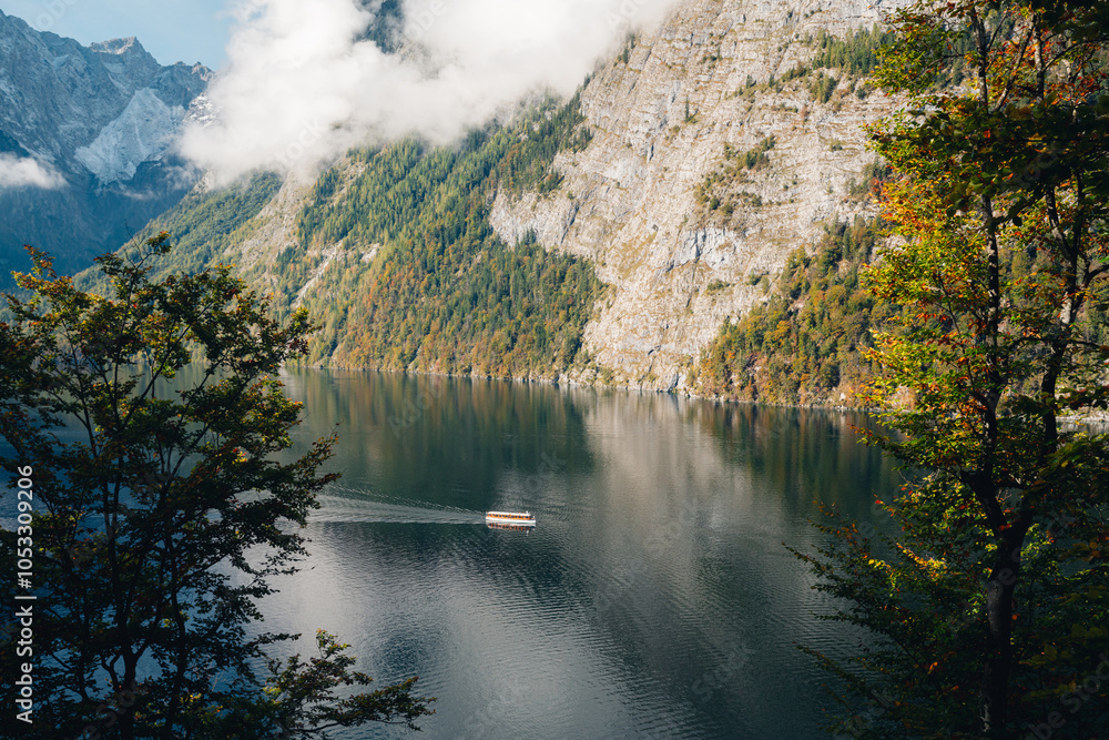 Lake Königssee with ship and mountains in Nationalpark Berchtesgaden, Bavaria, Germany