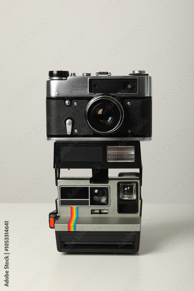 Retro cameras, shooting on retro cameras concept Retro cameras, shooting on retro cameras concept