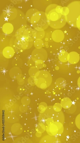 Gold Vertical Background Loop. Golden background with glitter stars, 10 seconds duration, seamless loop, vertical resolution.
